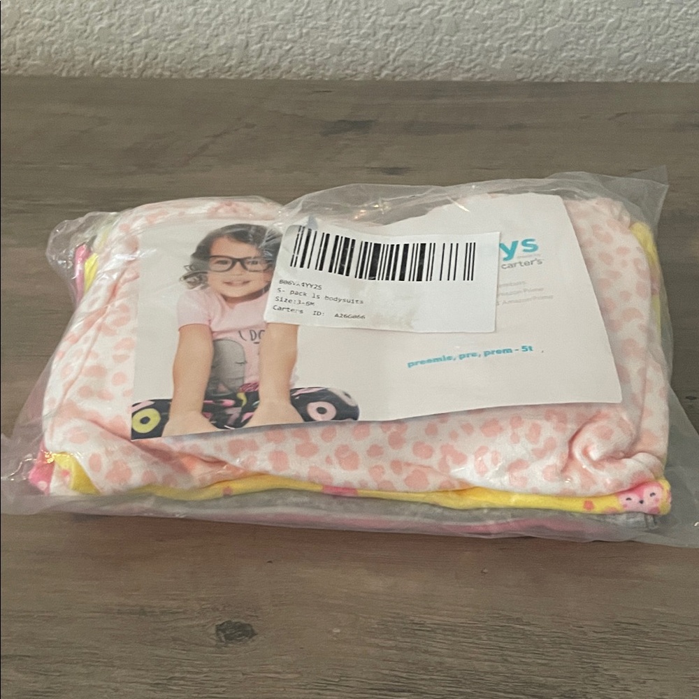 Carter's Pink and Yellow Kids Bodysuits